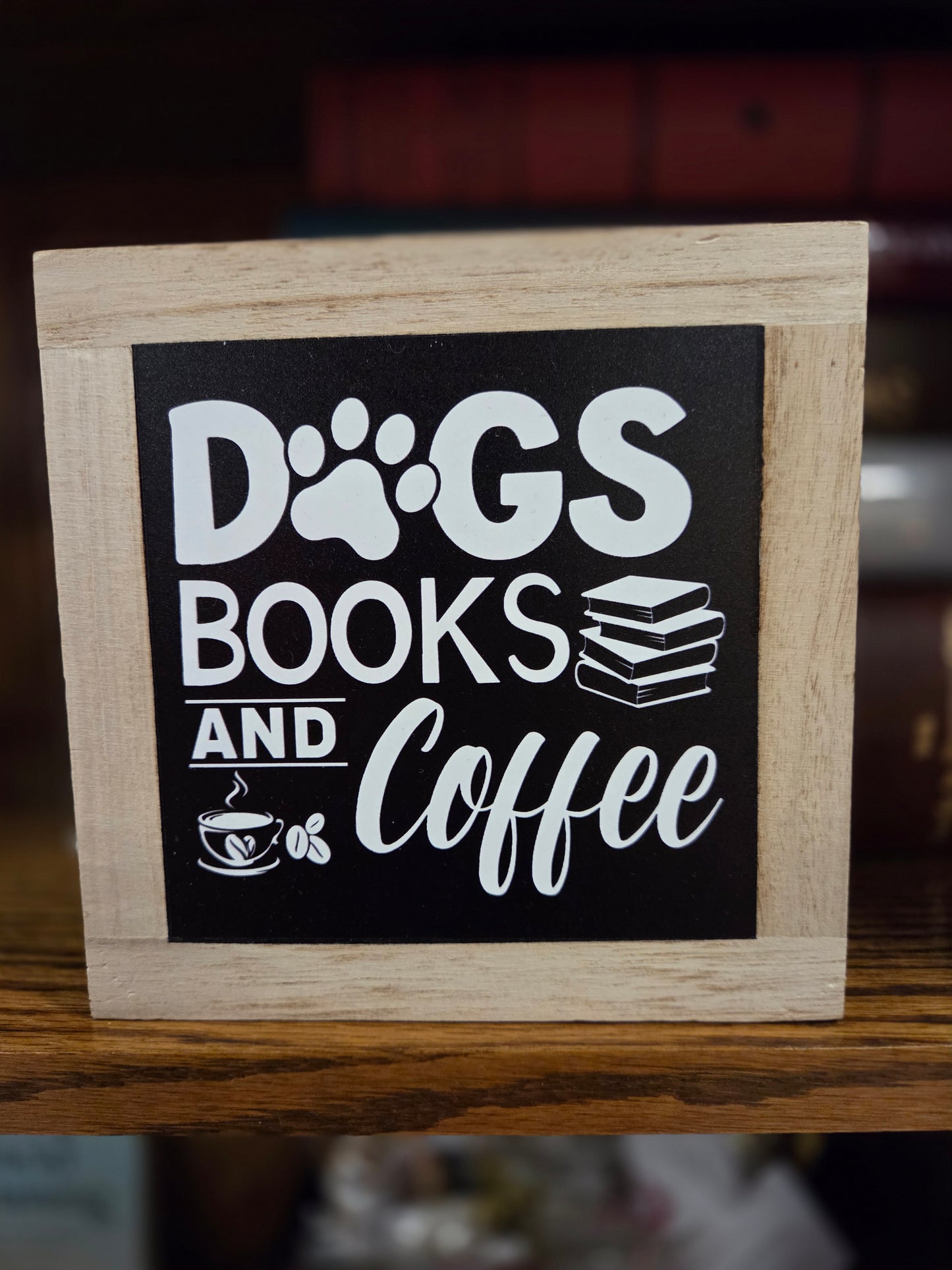 Dogs books coffee sign