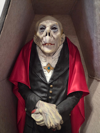 Dracula in coffin